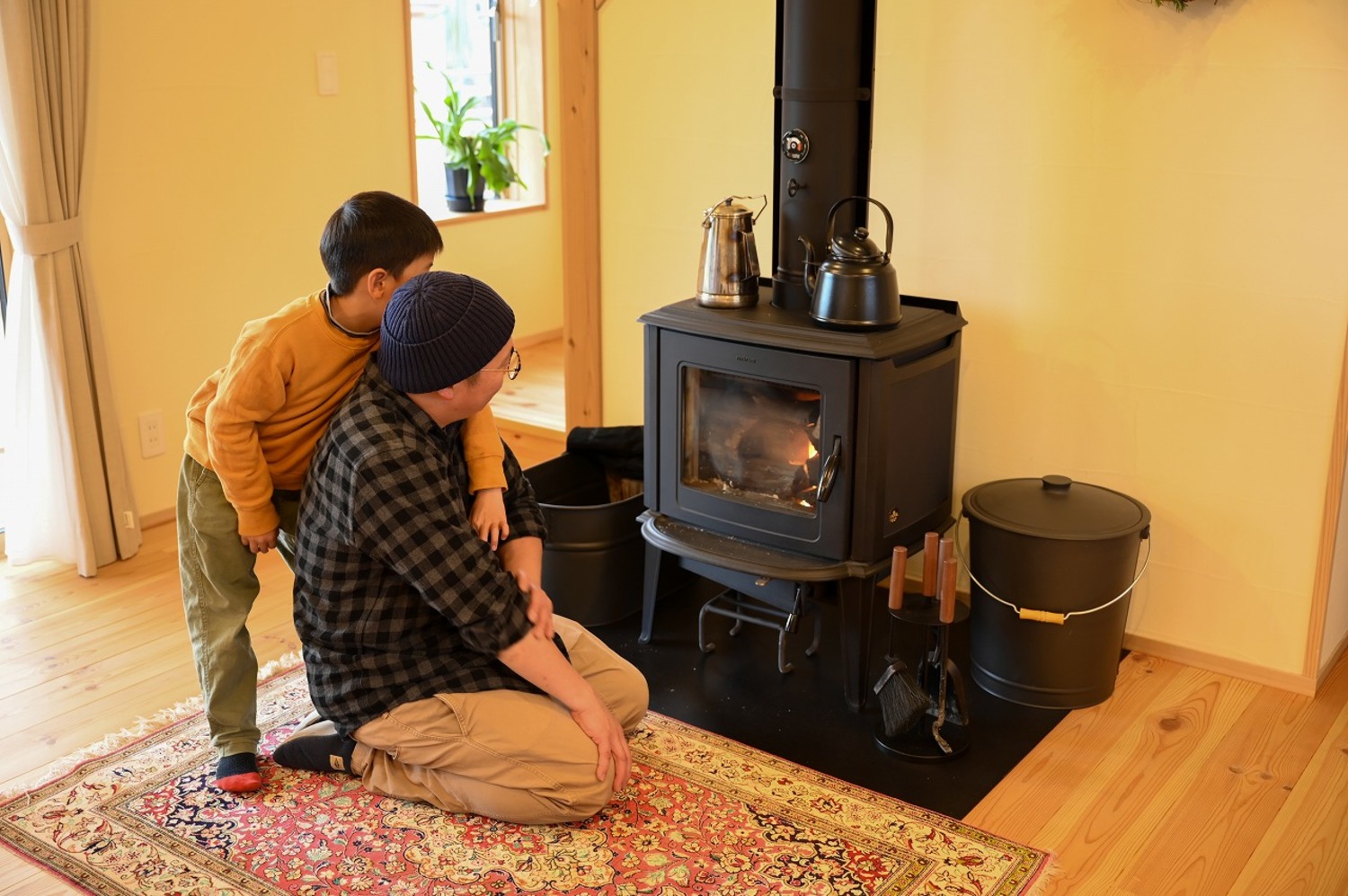薪ストーブが親子のコミュニケーションツールに。